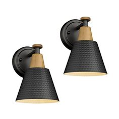 two black wall lights with wooden accents on the sides and one light in the middle