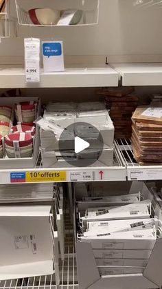 the shelves in a store are filled with files and folders, including file folders