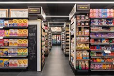 an aisle in a grocery store filled with lots of different types of foods and snacks