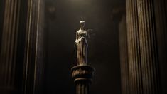 a statue is standing in the middle of some pillars and lights are shining down on it