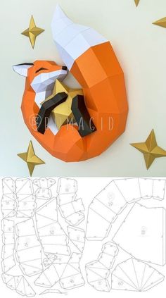 an origami pumpkin with scissors and paper stars around it, on top of a white background