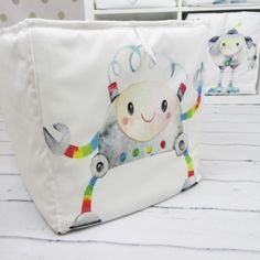 a white bag with an image of a child's airplane on it