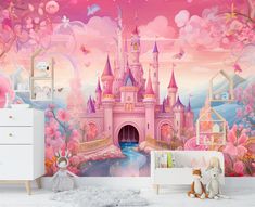 a child's bedroom with a pink castle mural