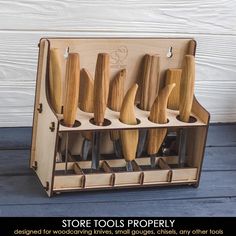 a wooden knife holder with six knives in it and the words store tools properly designed for woodworking has small groups, shelves, cabinets, any other tools or tools