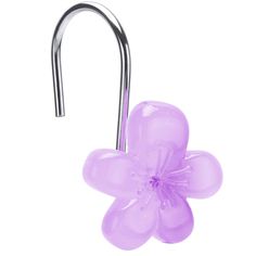 a purple flower shaped object hanging from a hook