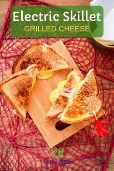 a grilled cheese sandwich cut in half on a cutting board with the title electric skillet grilled cheese