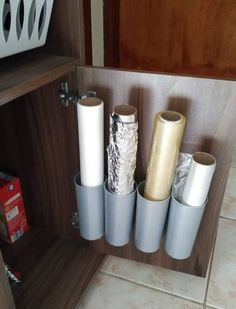 several rolls of duct tape in a cabinet