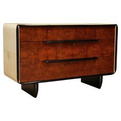 an art deco dresser with two drawers