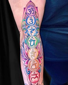 a person with a colorful tattoo on their arm