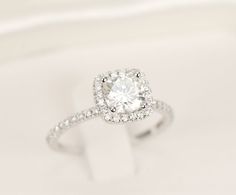 an engagement ring with diamonds on it