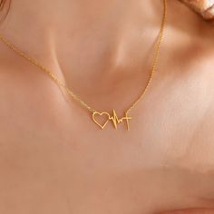 This collection of elegant and sophisticated necklaces features unique designs that celebrate the power of love and the rhythm of life. Each necklace features a beautiful and delicate pendant that showcases a heartbeat and heart motif in different ways.  This necklace is perfect for anyone who loves dainty and sophisticated jewelry, and it makes a wonderful gift for someone special in your life. It's versatile enough to wear every day and elegant enough to dress up for a special occasion. ♡ DAIN Rhythm Of Love Heartbeat Jewelry, Heartbeat Jewelry, Minimal Gold Jewelry, Snake Ring Gold, Necklace With Cross, Minimal Pendant, Heartbeat Necklace, Jewelry Hacks, Locket Design