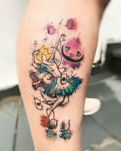 an artistic tattoo on the leg of a woman