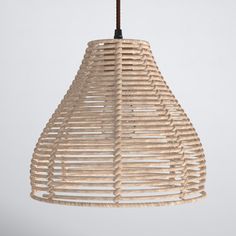 a wooden light fixture hanging from a ceiling