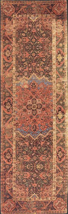 an antique rug with many different colors and patterns