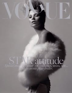 a woman in a fur coat is featured on the cover of an issue of magazine