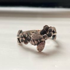 Rare Bee And Flower Three Dimensional Ring In Sterling Silver. Rwady To Gift And Just Lovely, With The Intricate Detailing Of A Bee That Sits Off The Finger. Absolutely Stunning Craftsmanship And Artistry~ It Is An Estimated Ring Size 5, 5.5 Or 6 And A Rare Collector's Piece No Longer Offered From James Avery, As It Is Retired. The James Avery Box/Dust Bag Is Not Included But It Will Be Packed In A Secure Box~ Please Look At Pictures And Feel Free To Message Me With Any Questions. Bottom Of The Bee And Flower, Bee Flower, James Avery Jewelry, Bee On Flower, James Avery, The James, Ring Color, Flower Ring, Womens Jewelry Rings