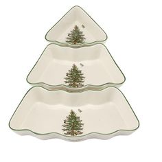 three serving dishes with christmas trees on them