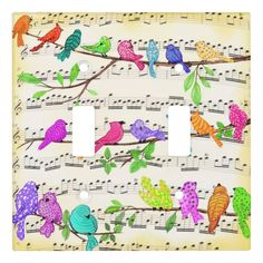 colorful birds sitting on top of musical notes