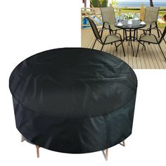 an outdoor table and chairs with a black cover