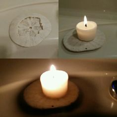 a lit candle sitting on top of a sink next to a bathtub with soap