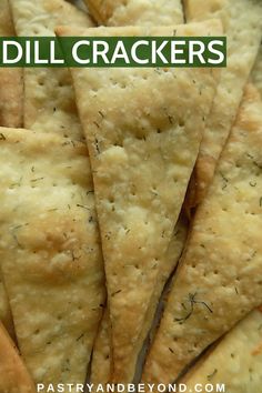 a close up view of some crackers with herbs on them and text overlay reads crunchy pita crackers