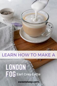 a cup of coffee with cream being poured into it and the words learn how to make a london fog grey latte