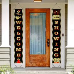 a welcome sign on the front door of a house