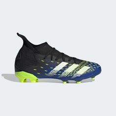 the adidas soccer shoe is shown in black and blue with neon yellow accents on the sole