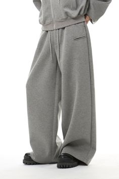 Experience the perfect blend of comfort and style with our Oversized Cropped Zip Hoodie and Wide-Leg Sweatpant Jogger Set. Designed for a relaxed fit and crafted from high-quality fabric, this set ensures effortless ease and a contemporary edge. The hoodie features a cozy zip-up design and shoulder padding for an urban, structured look, paired with a stylish hood. The wide-leg sweatpants complement the top with a fluid, fashion-forward silhouette. Together, they create a harmonious ensemble that Wide Leg Sweatpants, Tracksuit Set, Urban Wear, Jogger Set, Set Outfit, Comfortable Outfits, Comfy Outfits, Comfortable Fashion, Calgary