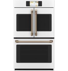 a white oven with two double doors and gold trimmings on the front, against a white background