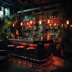 a dimly lit bar with stools and potted plants