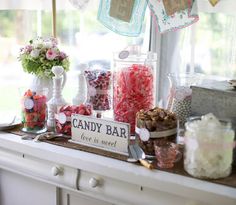 the candy bar is set up on the window sill