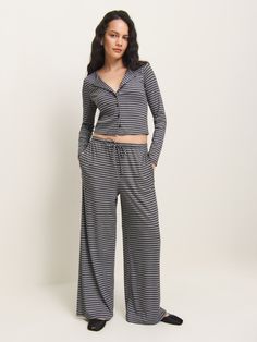 You make it look easy. Shop the Olina Knit Pant from Reformation, a mid rise pant with a relaxed fit and a drawstring waist. Vintage Inspired Jewelry, Heads Up, Knit Pants, New Tops, Jean Skirt, Grey Stripes, Skirt Pants, Active Wear For Women, Drawstring Waist