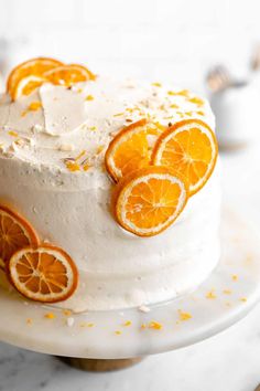 there is a cake with orange slices on it