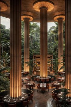 the interior of a restaurant with tall columns and round tables surrounded by greenery in front of large windows