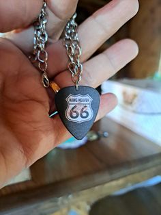 "This chain link bracelet with a unique \"Hawg Heaven\" Route 66 guitar pick and a \"Born to Ride\" charm would be a perfect Valentine gift.  It has a lobster clasp and measures 8 1/2\"." Born To Ride, Valentine Gift, Route 66, Guitar Pick, Chain Link Bracelet, Link Bracelets, Chain Link, Lobster Clasp, Valentine Gifts