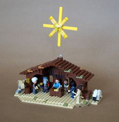 a lego nativity scene with the birth of jesus