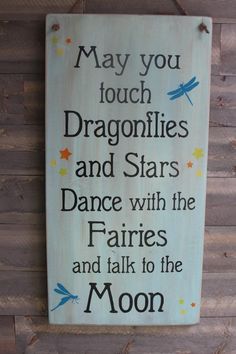 a wooden sign that says may you touch dragonflies and stars dance with the fairies and talk to the moon