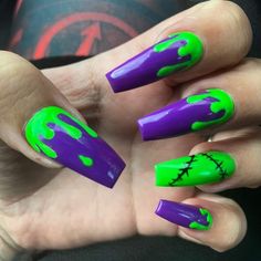 Neon Green And Purple Nails Design, Dripping Halloween Nails, Hulk Nails Art, Ghostbusters Nails Halloween, Neon Nails Halloween, Purple Green Nails Halloween, Slime Nails Design, Cute Spooky Halloween Nails Designs, Black And Green Spooky Nails