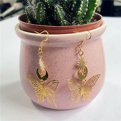 Material: Alloy Color: Gold Style: Sweet and Cool Style Handmade Moon Earrings For Party, Handmade Moon Shape Party Earrings, Handmade Moon-shaped Party Earrings, Whimsical Gold Jewelry For Summer, Whimsical Gold Earrings, Ethnic Earrings, Star Moon, Ethnic Patterns, Earring Patterns