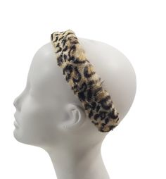 1960's/1970's NOS Faux Leopard Print Fur Headband  New Old Stock faux fur headband in a leopard print with 2 elastic bands that connect the ends together. Has original tag still attached. Label: The Halle Bros. Co. Measurements taken flat; Length: 10 3/4 inches Width: 1 3/8 inches  Vintage is anything over 20 years old, I try my best to disclose any flaws that are visible, such as stains, discolorations, damage and normal wear and tear. All Sales are Final. Item will ship within 3 to 5 business days Domestic Shipping via USPS  International Shipping via USPS International First Class unless item is over 4 lbs. ~~Thank you for Shopping with Kris's Vintage Clothing~~ Faux Fur Headband, Fur Headband, 20 Years Old, Turbans, Hair Accessories Headbands, Halle, Elastic Band, 20 Years, Vintage Clothing