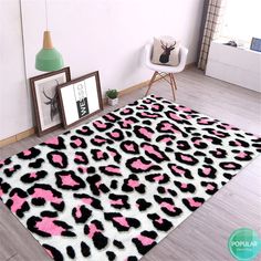 a pink and black leopard print area rug