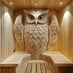 an owl carved into the side of a sauna