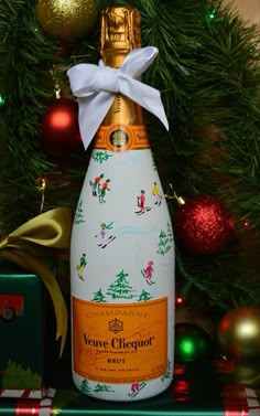 Holiday Painted Champagne Bottle Holiday Bottle Crafts, Vueve Champagne Painted Bottle, Painted Wine Bottles Christmas Diy, Veuve Clicquot Painted Bottle, Veuve Painted Bottle, Painted La Marca Bottle, Painted Christmas Champagne Bottle, Painting On Champagne Bottle