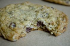 an oatmeal chocolate chip cookie is broken in half