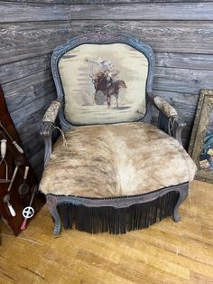 an old chair with some hair on it