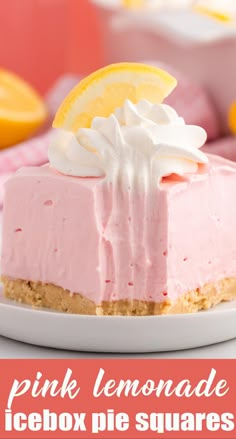 a piece of cake on a plate with lemons in the background