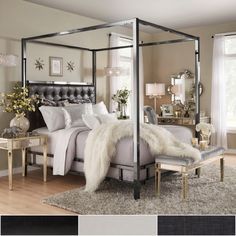 a four poster bed with white fur on it