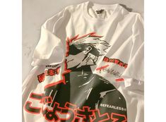 Featuring a vibrant graphic from the popular anime series, this shirt is perfect for any anime lover. Comfortable and stylish, it's great for casual wear and makes an excellent gift for Jujutsu Kaisen fans.  Features  Jujutsu Kaisen Graphic Design: Features a striking print inspired by the popular anime series, perfect for fans. Comfortable Fit: Made from soft, breathable fabric for all-day comfort. Unisex Style: Designed to suit anime lovers of all genders, making it a versatile addition to any Harajuku Women, Streetwear Tops, Swimsuits High Waisted, Anime Shirt, T Shirt Oversized, Casual T Shirt, Oversized T Shirt, T Shirt Funny, Unisex Shorts