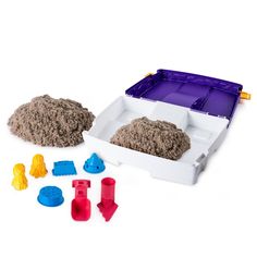 two plastic containers filled with sand and toys